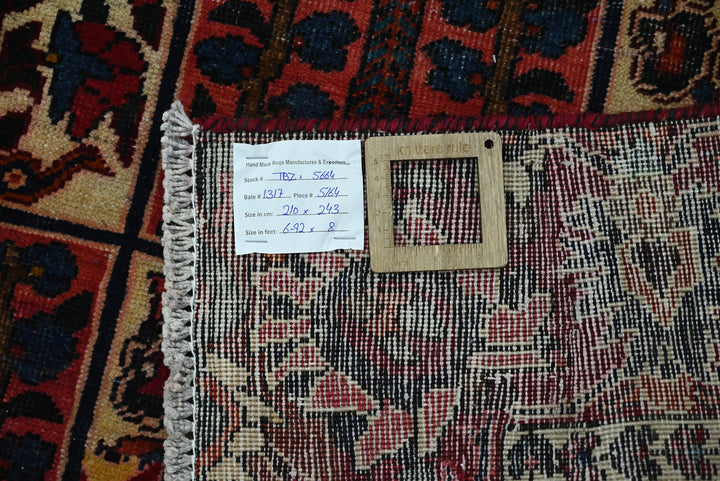 red Large rug 6' 11" x 8' 0"