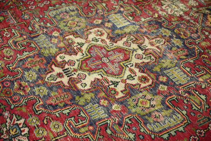red Medium rug 5' 6" x 7' 7"