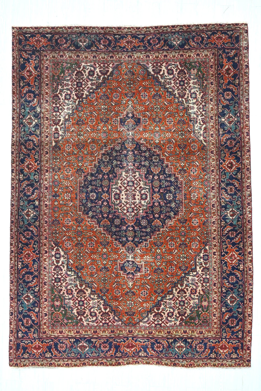 orange Medium rug 6' 6" x 9' 2"