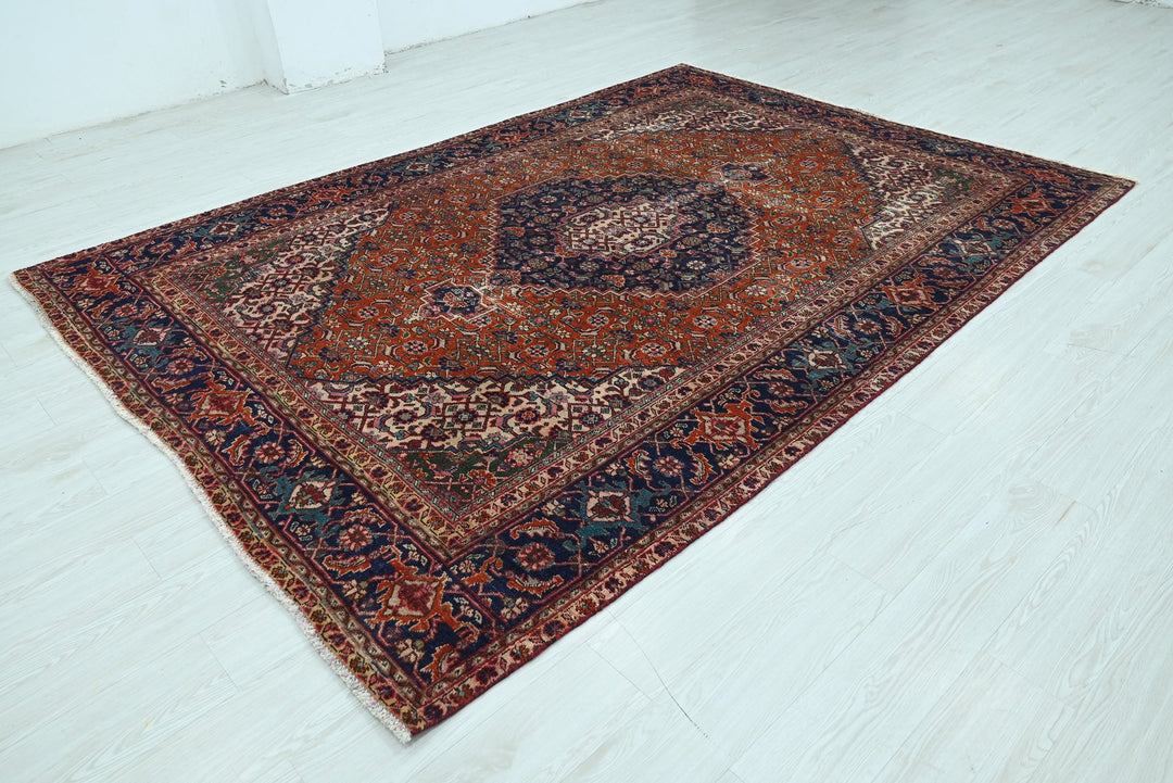 orange Medium rug 6' 6" x 9' 2"
