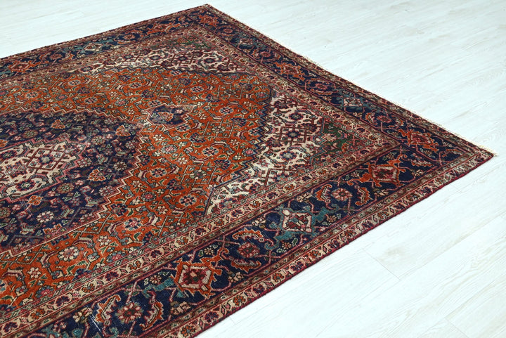 orange Medium rug 6' 6" x 9' 2"