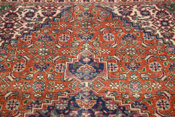 orange Medium rug 6' 6" x 9' 2"