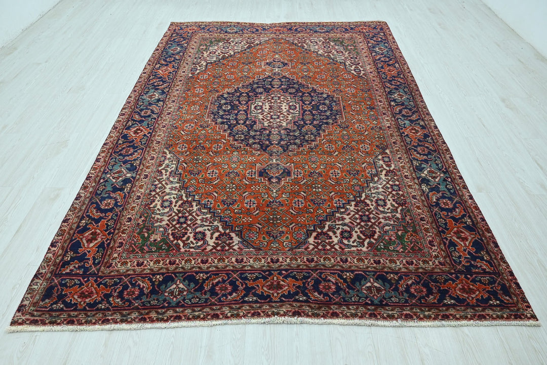 orange Medium rug 6' 6" x 9' 2"