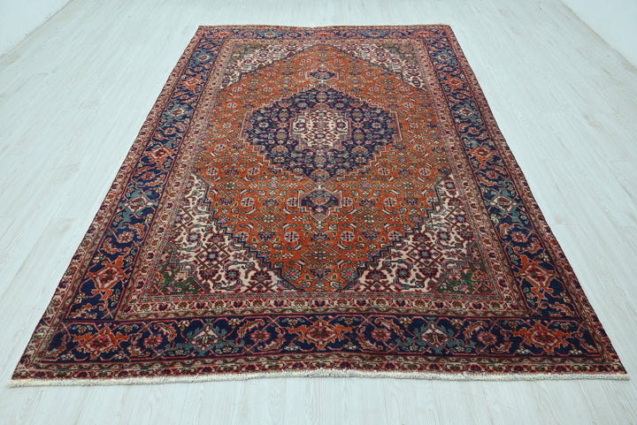 orange Medium rug 6' 6" x 9' 2"