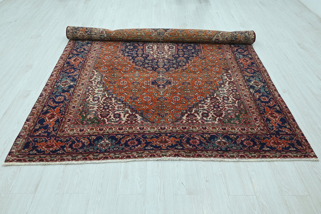 orange Medium rug 6' 6" x 9' 2"