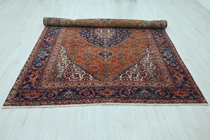 orange Medium rug 6' 6" x 9' 2"