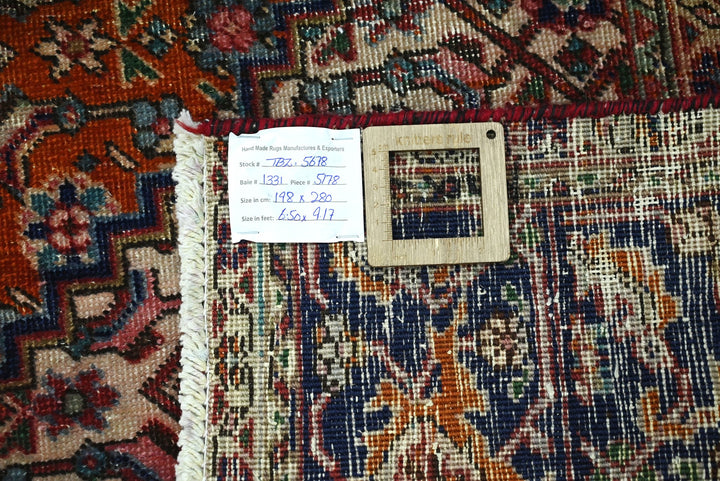 orange Medium rug 6' 6" x 9' 2"