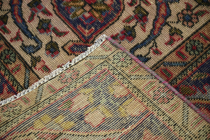 red Large rug 6' 7" x 9' 8"