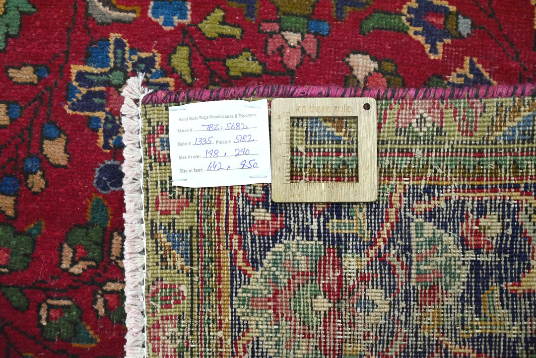 red Large rug 6' 6" x 9' 6"