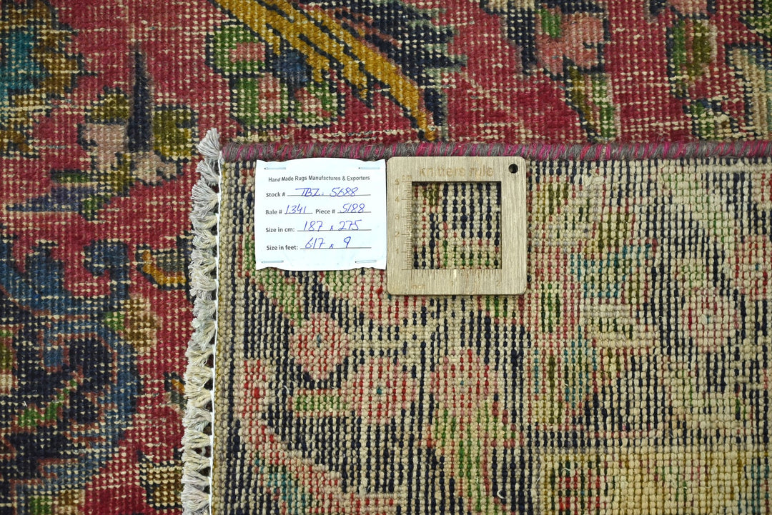 red Medium rug 6' 2" x 9' 0"