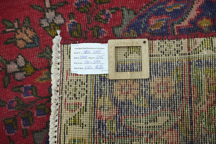 red Large rug 6' 3" x 9' 6"