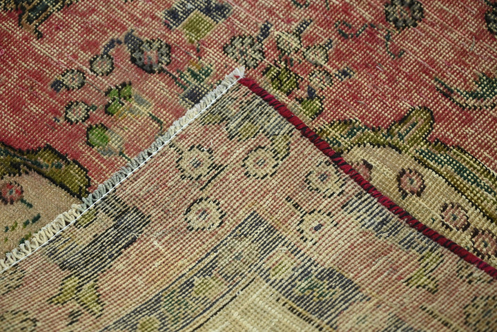 red Medium rug 5' 6" x 8' 10"