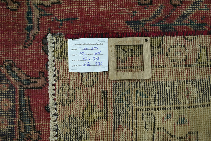 red Medium rug 5' 6" x 8' 10"