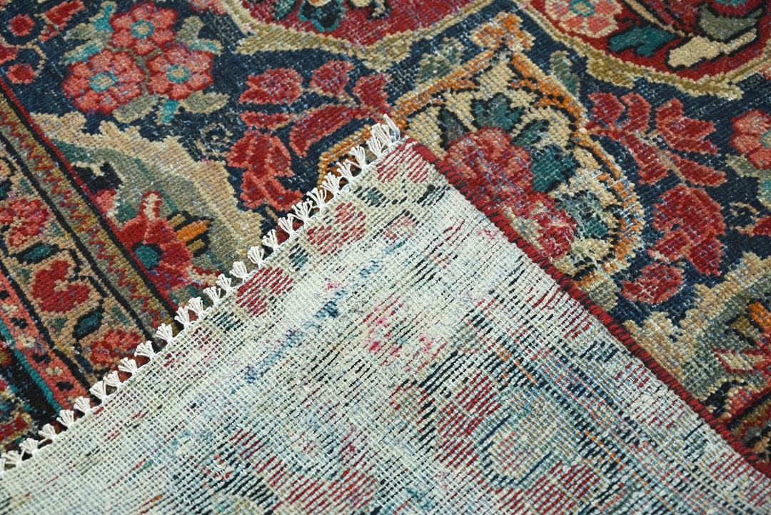 red Large rug 6' 9" x 9' 9"