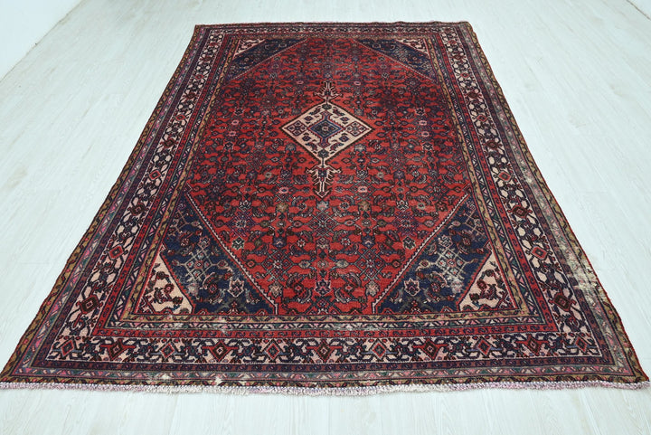 red Large rug 6' 5" x 9' 8"