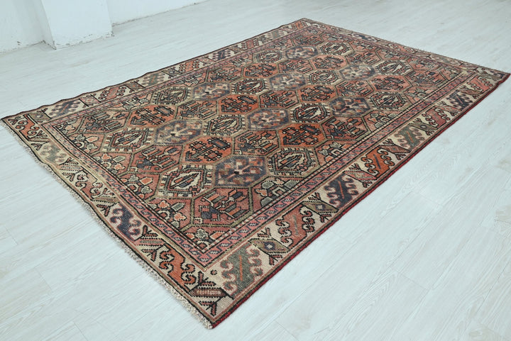 orange Medium rug 5' 10" x 9' 0"