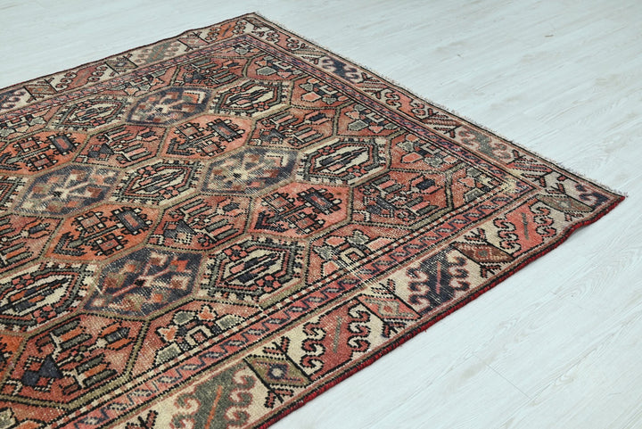 orange Medium rug 5' 10" x 9' 0"