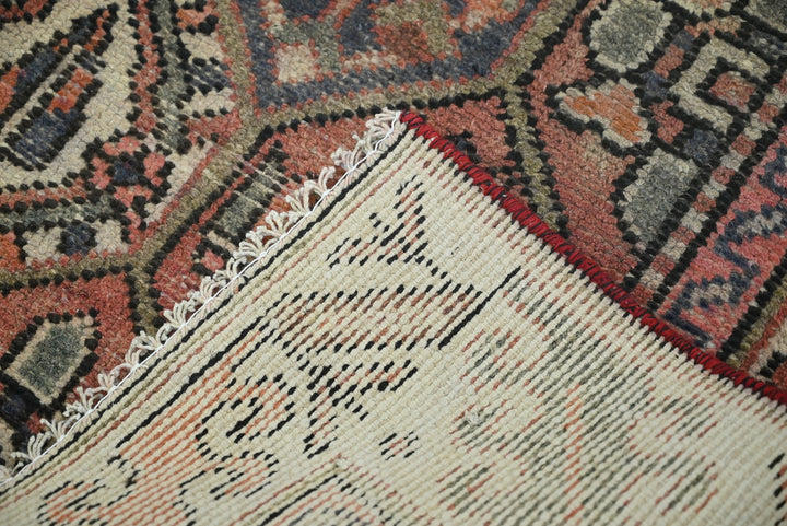 orange Medium rug 5' 10" x 9' 0"