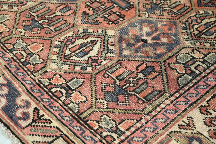 orange Medium rug 5' 10" x 9' 0"