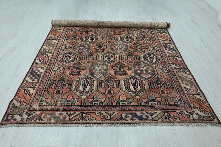 orange Medium rug 5' 10" x 9' 0"