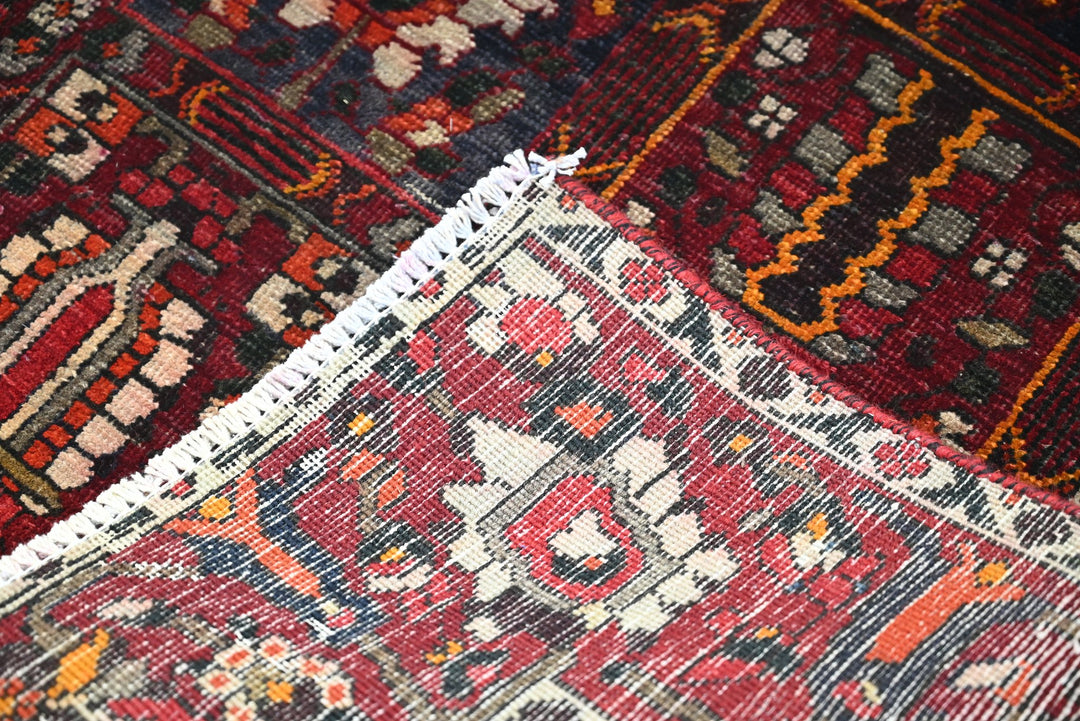 red Large rug 6' 5" x 9' 6"