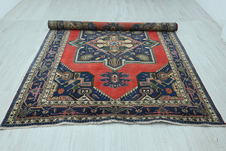 red Large rug 7' 7" x 9' 6"