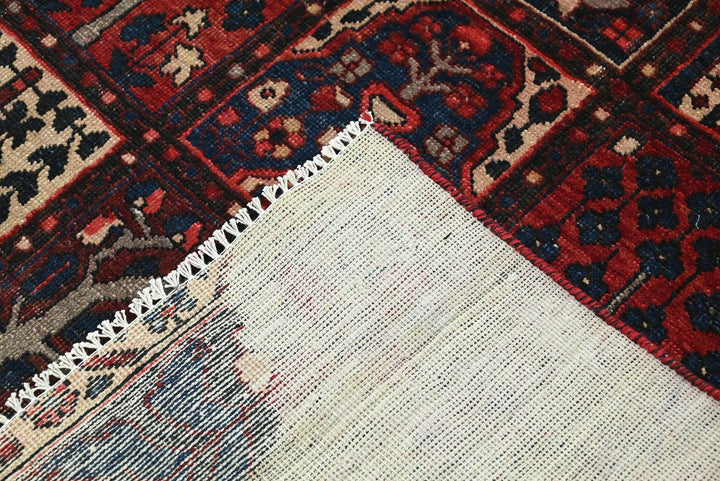 red Large rug 6' 7" x 9' 10"