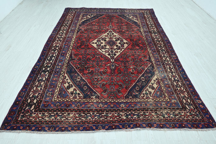 red Large rug 6' 9" x 10' 1"