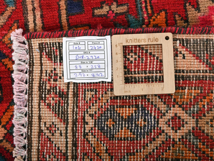 a piece of wood sitting on top of a rug