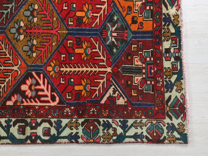 a multicolored rug on a white surface
