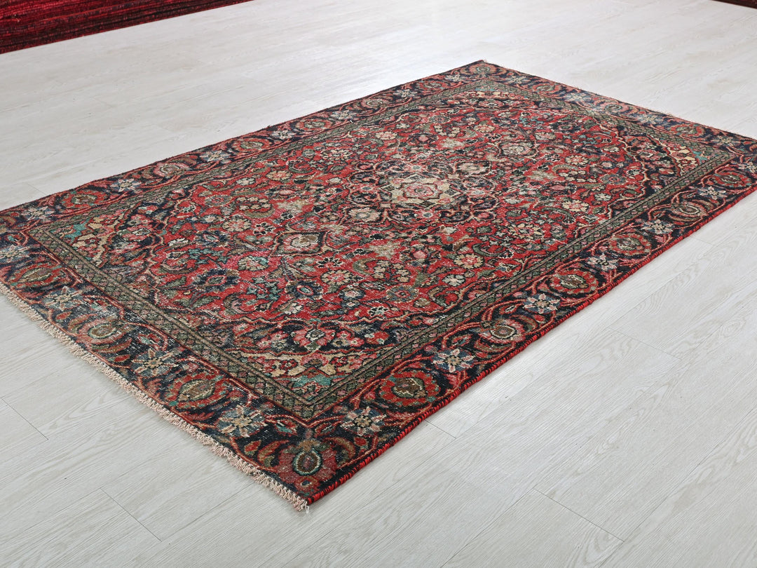 a large oriental rug on a white floor