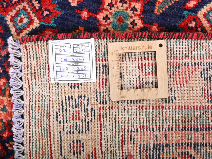 a piece of wood sitting on top of a rug