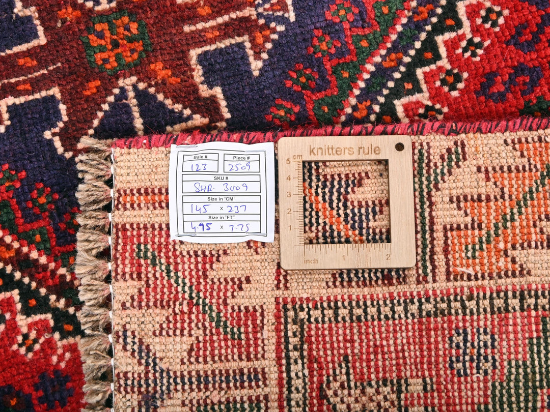 a close up of a rug with a tag on it