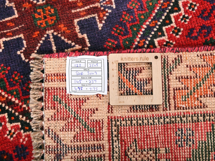 a close up of a rug with a tag on it