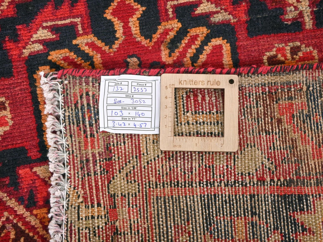 a piece of wood sitting on top of a rug