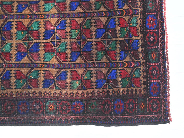 a multicolored rug with a design on it