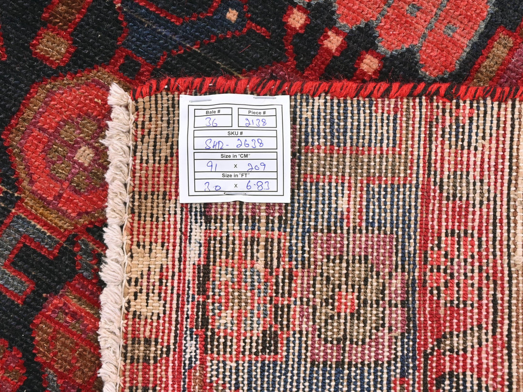 a close up of a rug with a tag on it