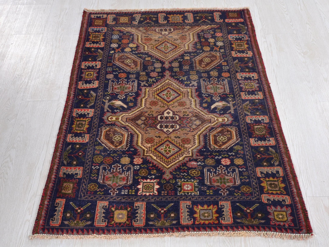 a rug is laying on a white floor