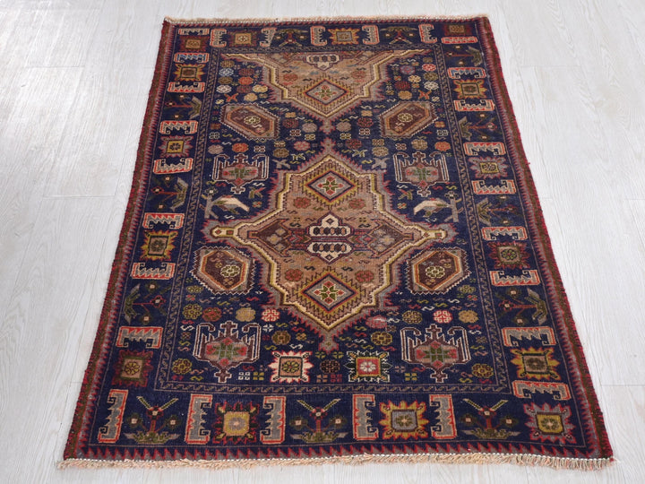 a rug is laying on a white floor