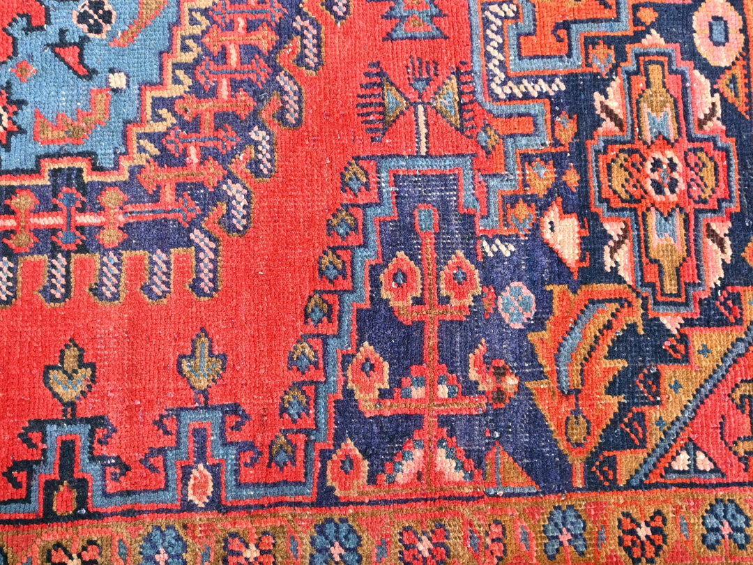 an oriental rug with many different colors and patterns