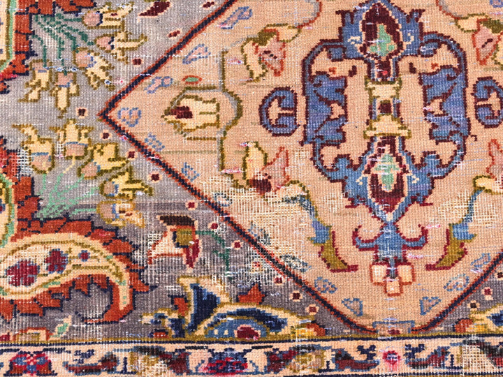a close up of a rug with many different colors