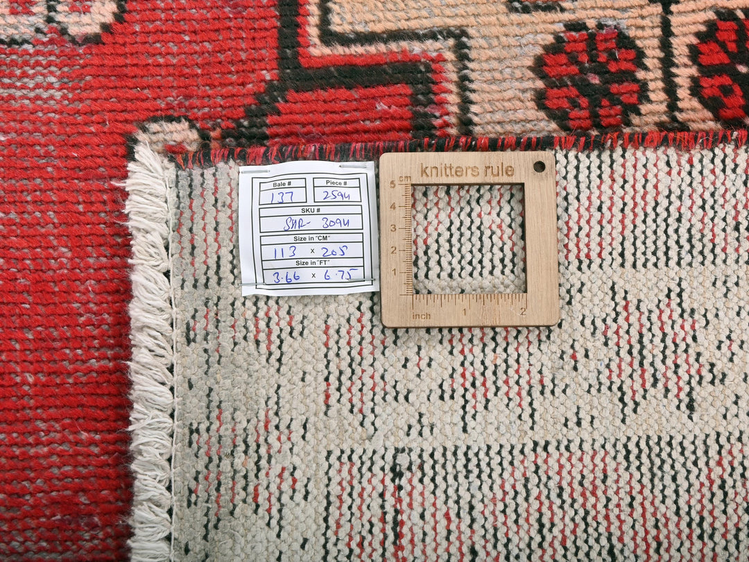 a close up of a rug with a tag on it