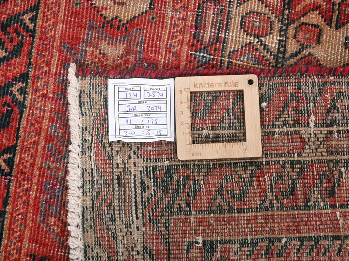 a piece of wood sitting on top of a rug