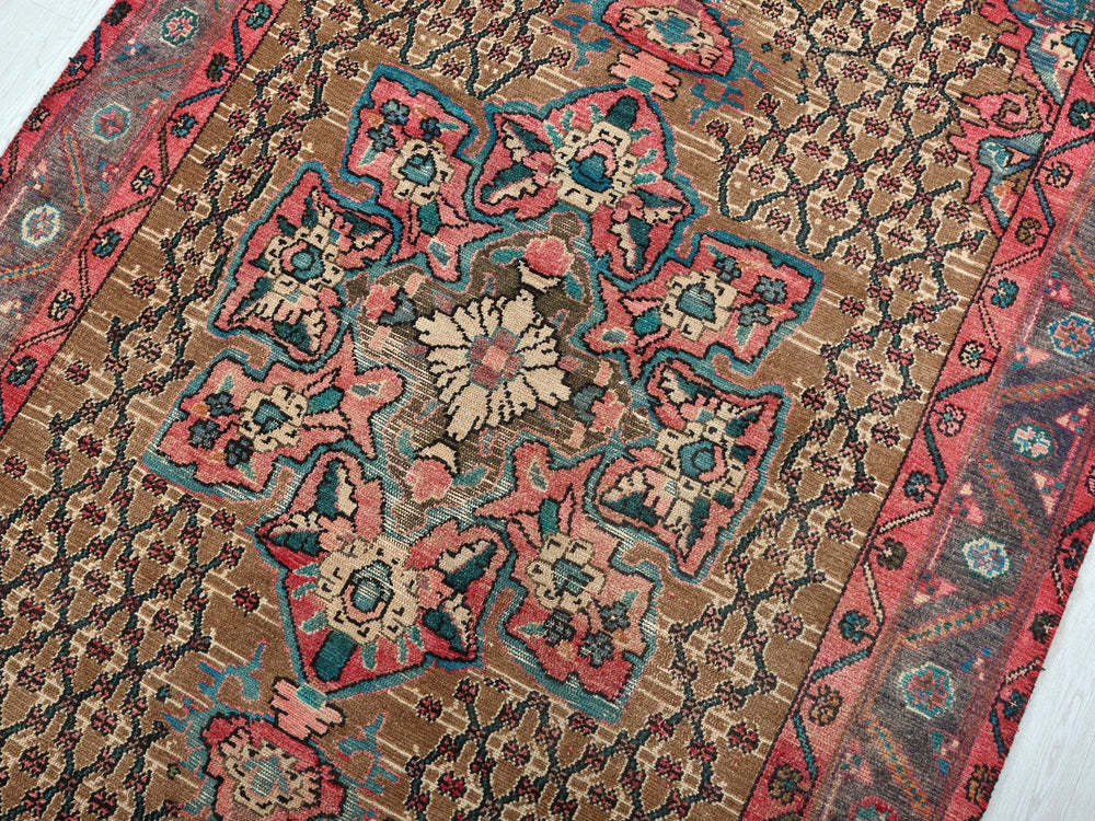 a large oriental rug on a wooden floor