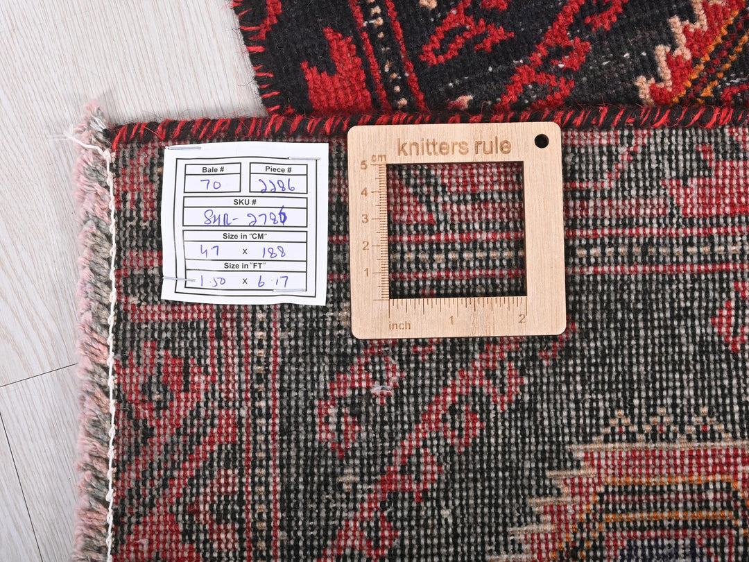 a piece of wood sitting on top of a rug
