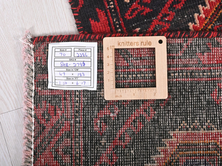 a piece of wood sitting on top of a rug