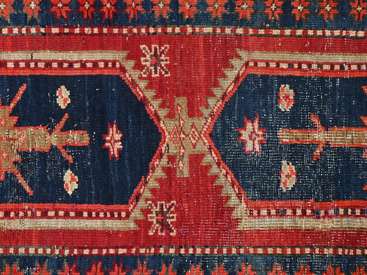a close up of a red and blue rug