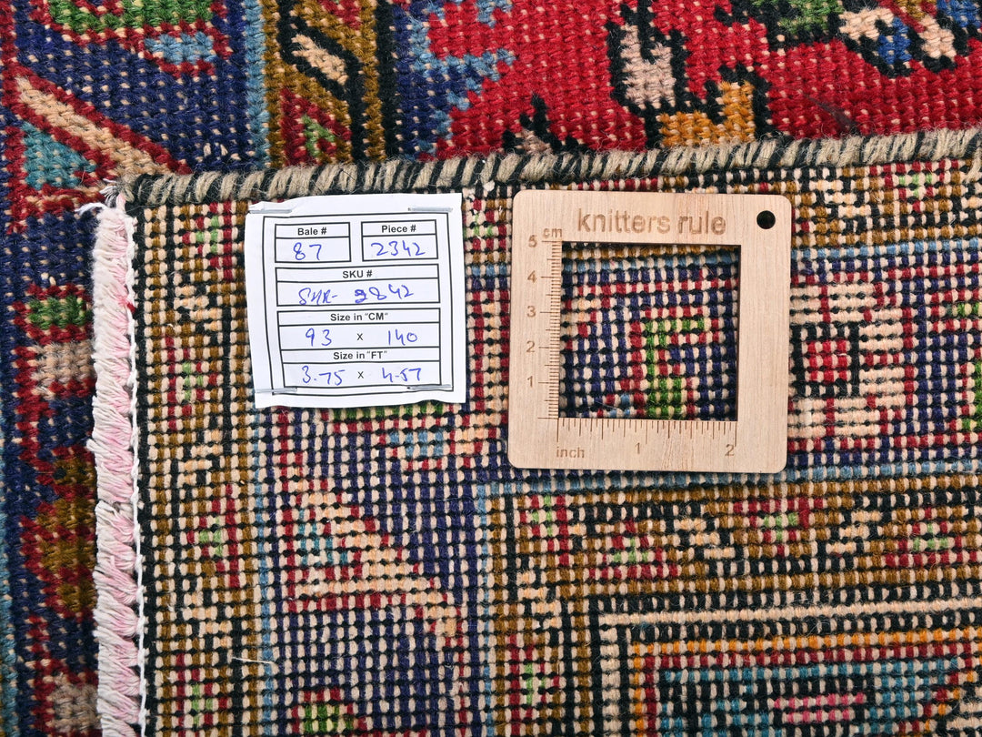 a piece of wood sitting on top of a rug