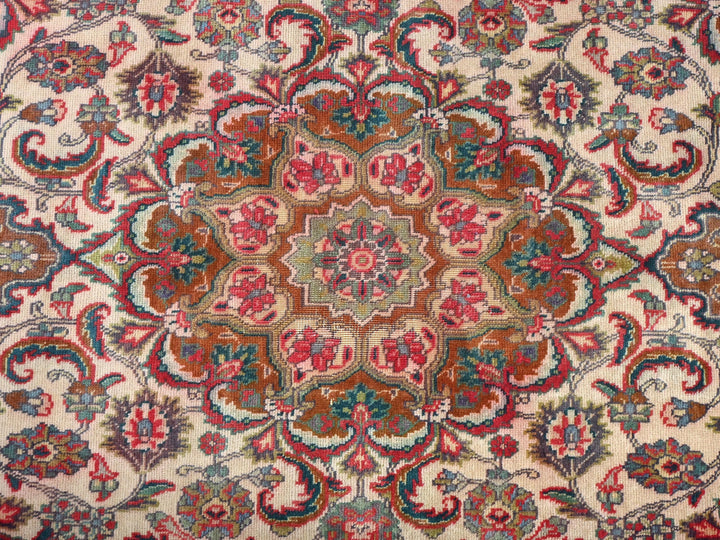 an oriental rug with a red, blue, and green design