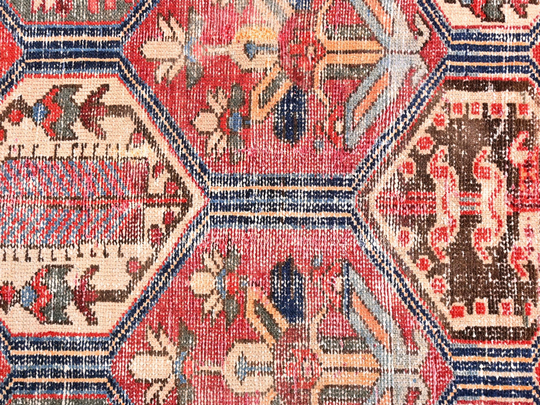 a close up of a rug with a pattern on it